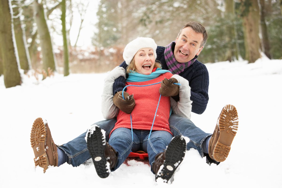 Couple sledding